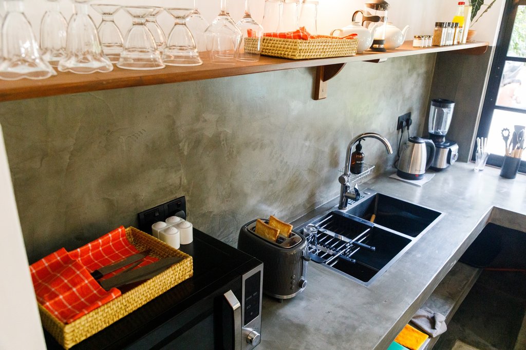 Safiya kitchen counter with shelving
